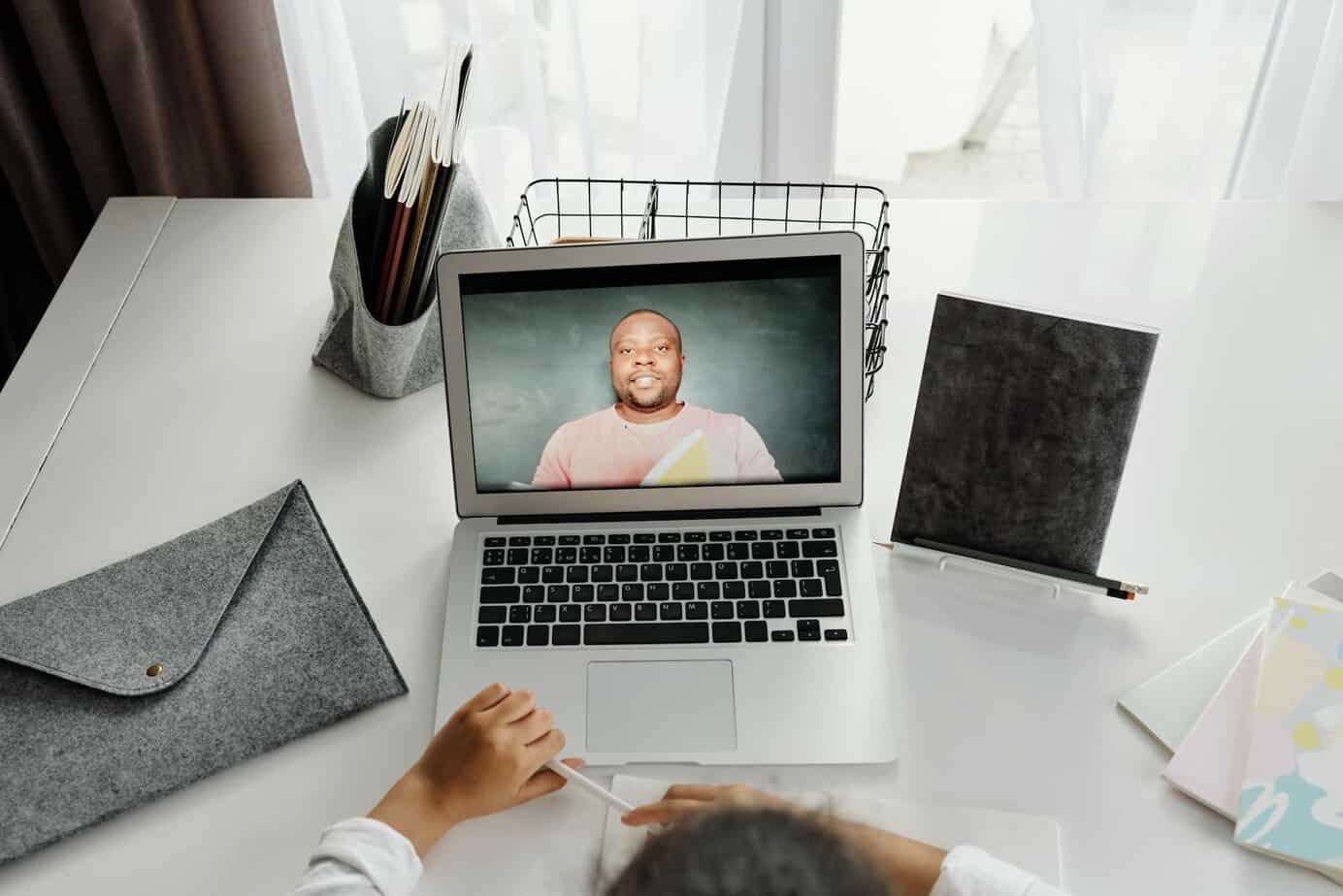 Expert reveals the top five benefits of remote learning - person talking classes online
