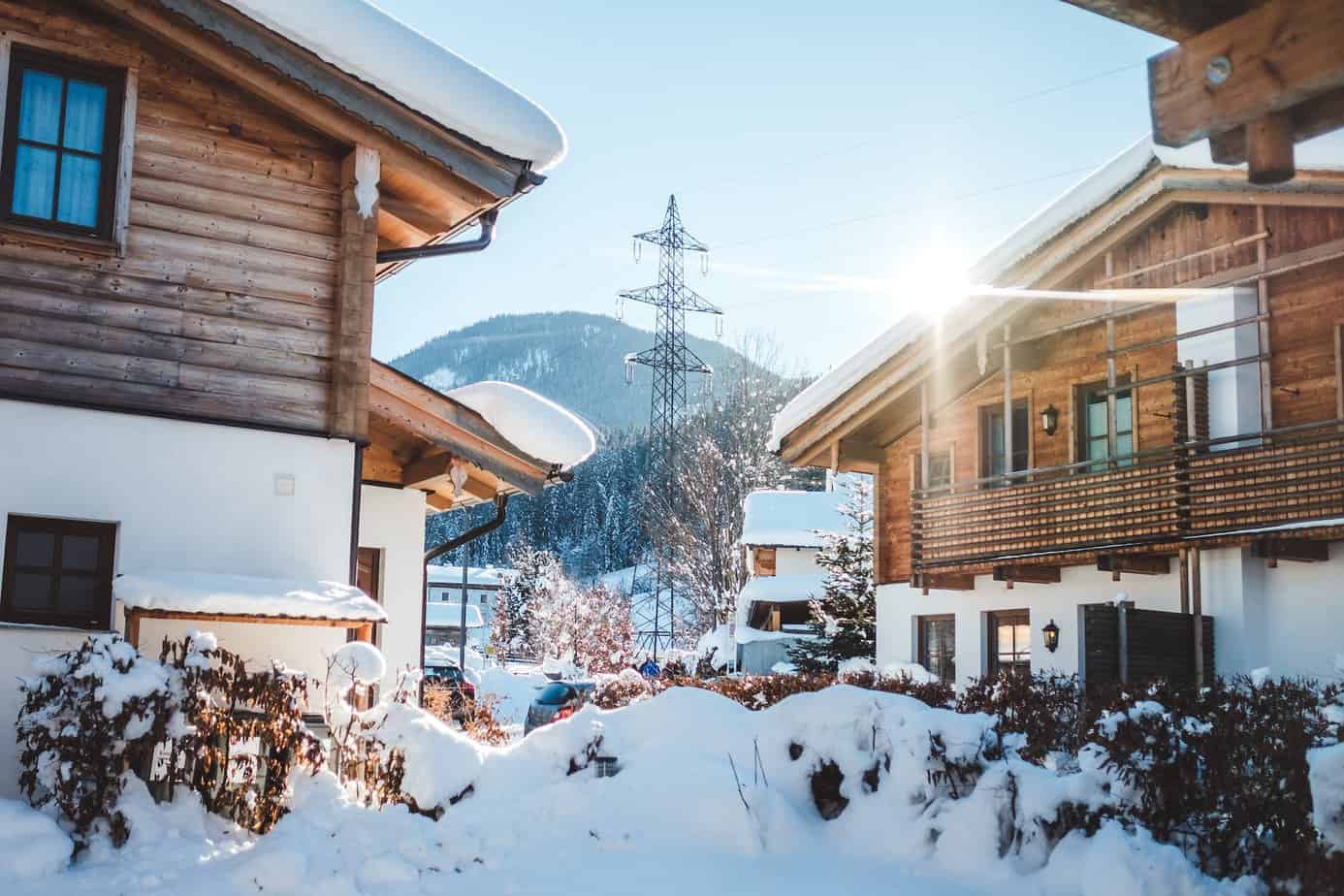 houses in city during winter - Ways to recharge after a day on the slopes